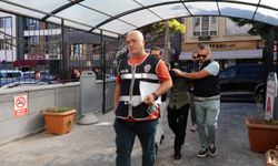 Eşini sokak ortasında dövmüştü, adliyeye sevk edildi