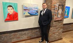 Otizmli ressam Alp Eren Candan'ın resim sergisi